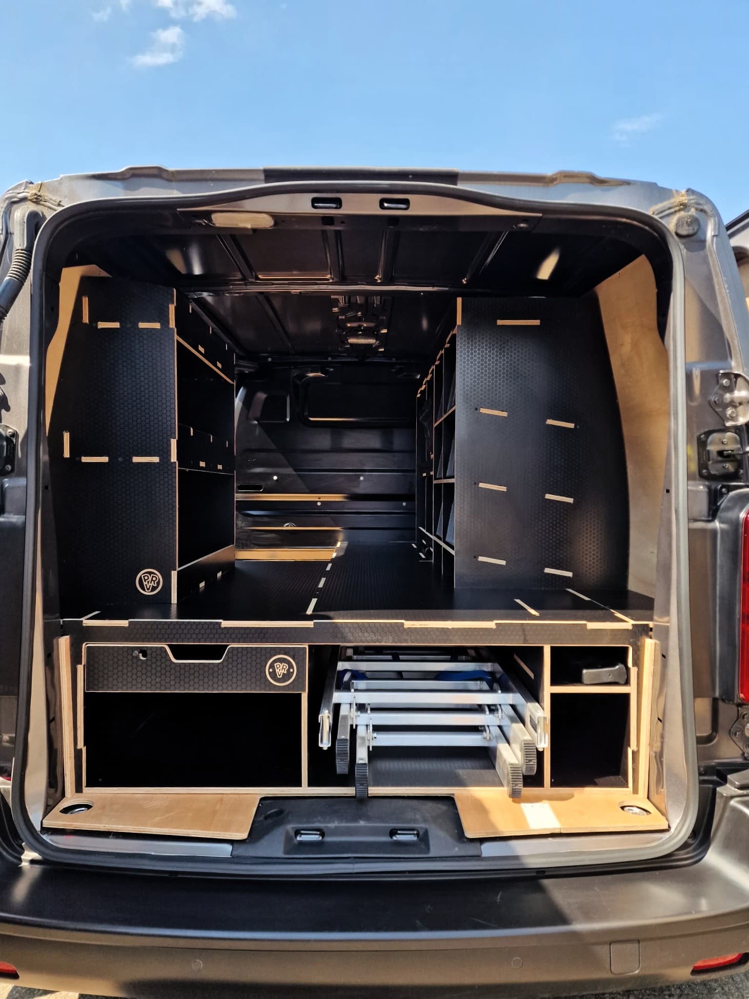 How to carry ladders and long materials safely in your van