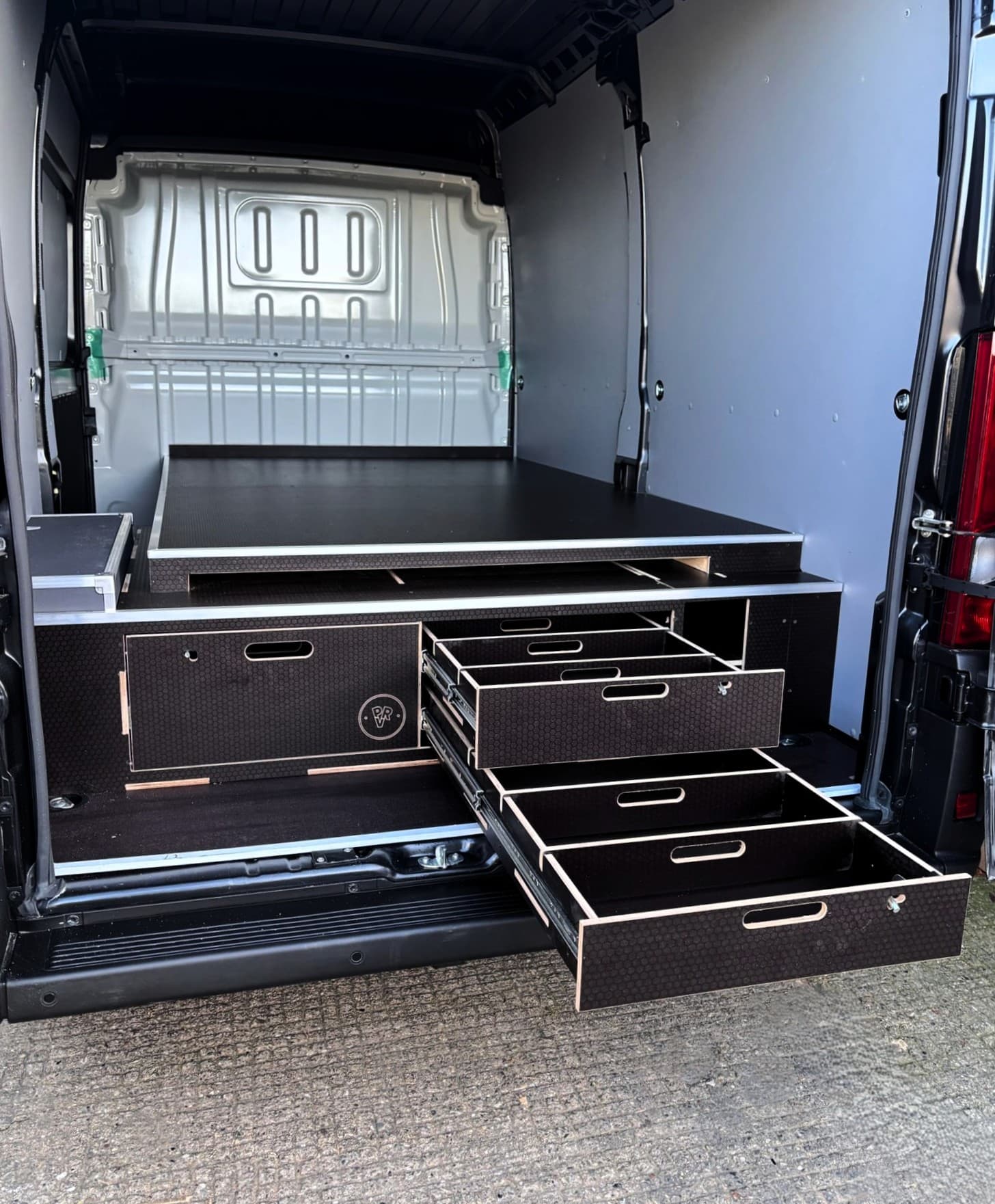 Why more tradespeople are building sheet storage into their van floor