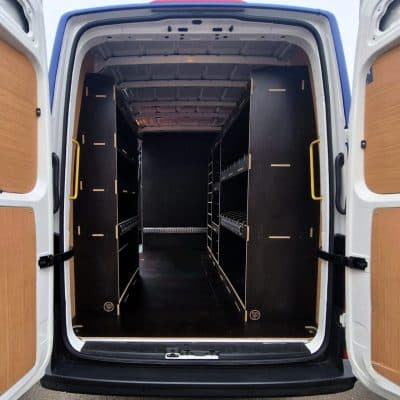 Custom ply van racking with shelving system installed in medium wheelbase commercial vehicle for fleet use by Ply Van Racking Ltd