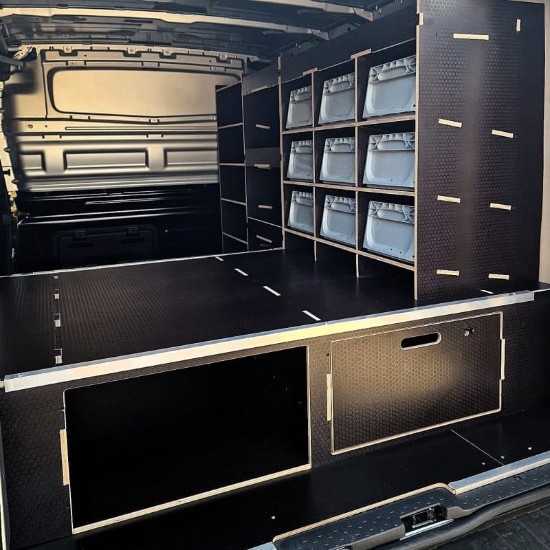 Versatile van drawer and racking system with raised floor pull-out drawer and shelving layout by Ply Van Racking Ltd