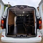 Versatile angled racking with integrated floor by Ply Van Racking Ltd.