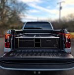 Pickup bed drawer unit with deep side storage compartments and long material storage by Ply Van Racking Ltd